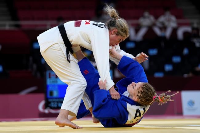 Algeria's Cherine Abdellaoui, right, competes against Canada's Priscilla Gagne in women's 52kg judo gold medal match at the Tokyo 2020 Paralympic Games, in Tokyo, Friday, Aug. 27, 2021. THE CANADIAN PRESS/AP-Kiichiro Sato
