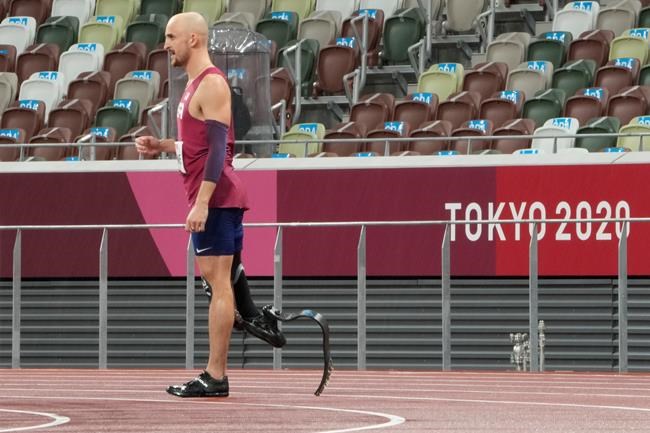 Sam Grewe of the United States prepares to compete in the men's high jump T63 final during the Tokyo 2020 Paralympics Games at the National Stadium in Tokyo, Japan, Tuesday, Aug. 31, 2021. (AP Photo/Eugene Hoshiko)