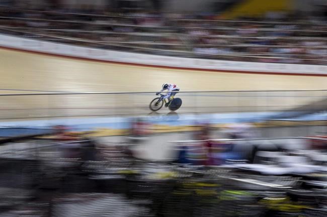Canada's Kate O'Brien competes in the women's sprint 1/8 finals during cycling track at the Pan Am games in Milton, Ont., on Saturday, July 18, 2015. THE CANADIAN PRESS/Chris Young
