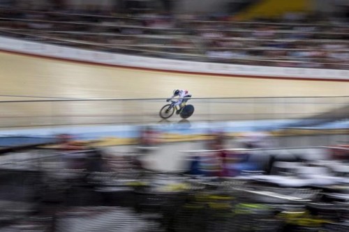 Canada's Kate O'Brien competes in the women's sprint 1/8 finals during cycling track at the Pan Am games in Milton, Ont., on Saturday, July 18, 2015. THE CANADIAN PRESS/Chris Young
