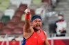 FILE - In this Tuesday, Aug. 31, 2021, file photo, Muhammad Ziyad Zolkefli of Malaysia reacts after competing in the men's shot put F20 final during the Tokyo 2020 Paralympics Games at the National Stadium in Tokyo. Zolkefli appeared to have won gold in the shot put in the F20 class. But after the victory on Tuesday, he was disqualified because he had shown up late for the competition. (AP Photo/Eugene Hoshiko, File)