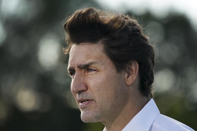 Liberal Leader Justin Trudeau’s hair blows in the wind as he makes a campaign stop during the Canadian federal election campaign in Montreal, Que., on Tuesday, Sept. 7, 2021. THE CANADIAN PRESS/Nathan Denette