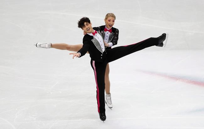 Canada's Piper Gilles and Paul Poirier compete in the Ice Dance – Rhythm Dance program during the figure skating Grand Prix finals at the Palavela ice arena, in Turin, Italy, Friday, June 7, 2019. THE CANADIAN PRESS/AP-Antonio Calanni