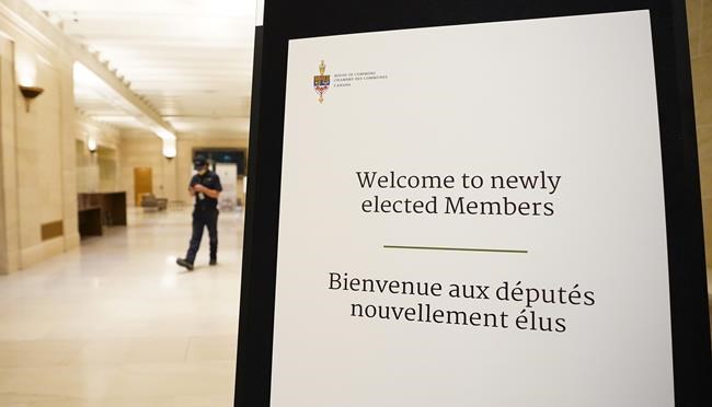 A House of Commons message board welcomes newly elected members of Parliament in Ottawa on Monday, Sept. 27, 2021. THE CANADIAN PRESS/Sean Kilpatrick