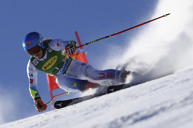 United States' Mikaela Shiffrin speeds down the course during an alpine ski, women's World Cup giant slalom, in Soelden, Austria, Saturday, Oct. 23, 2021. (AP Photo/Marco Trovati)