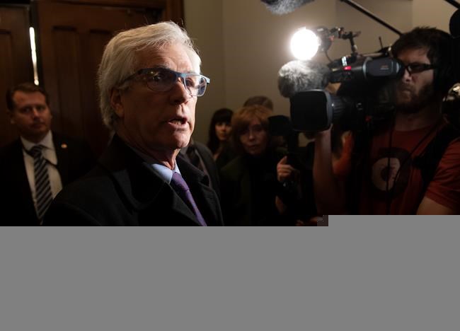 Liberal MP Jim Carr speaks with the media before entering the Prime Minister's Office on Parliament Hill in Ottawa on Nov. 21, 2019. In an interview with The Canadian Press, Carr says he respects Prime Minister Justin Trudeau's decision not to include him in the new federal cabinet. THE CANADIAN PRESS/Adrian Wyld