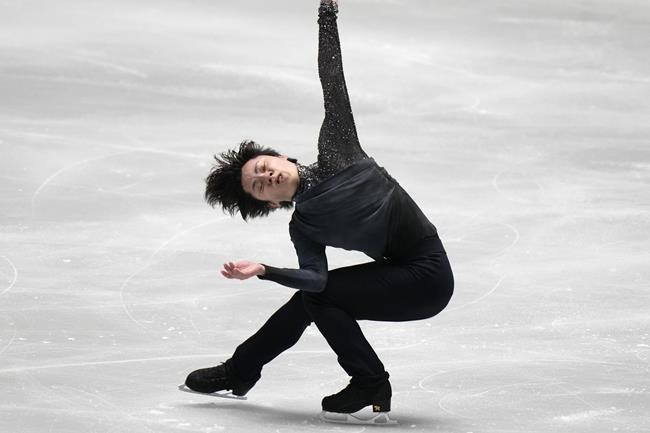 Shoma Uno of Japan performs during the men's short program of the ISU Grand Prix of Figure Skating NHK Trophy competition in Tokyo, Japan, Friday, Nov. 12, 2021.(AP Photo/Shuji Kajiyama)