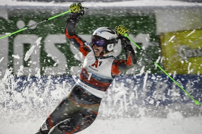 Norway's Thea Louise Stjernesund celebrates after winning her semifinal, during an alpine ski, women's World Cup parallel event, in Lech/Zuers, Austria, Saturday, Nov. 13, 2021. (AP Photo/Marco Trovati)