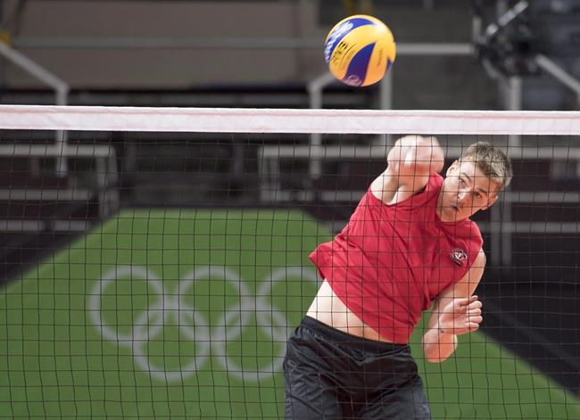 Canadian Olympic men's volleyball team member Gord Perrin spikes a ball during team practice at the 2016 Summer Olympics Wednesday, August 3, 2016 in Rio de Janeiro, Brazil. Perrin, Canada's captain at the Tokyo Olympics, has retired from the men's national volleyball team. THE CANADIAN PRESS/Frank Gunn