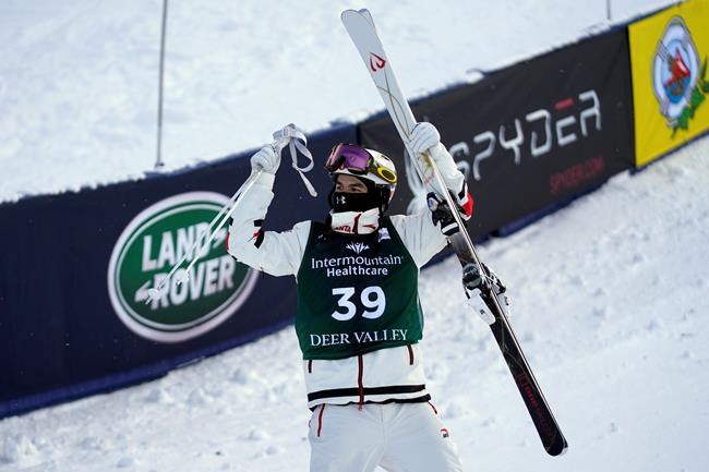 Canada's Mikael Kingsbury reacts after winning the World Cup men's freestyle moguls skiing competition in Deer Valley, Utah, Thursday, Feb. 4, 2021. Kingsbury opened the World Cup season with a moguls victory Saturday at the same venue where he suffered a back injury a year earlier. THE CANADIAN PRESS/AP-Rick Bowmer