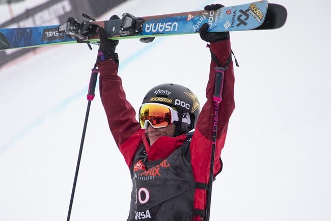 Alex Ferreira, of United States, reacts after seeing his score following a run in the halfpipe Friday, Dec. 10, 2021, during the U.S. Grand Prix freestyle skiing event at Copper Mountain, Colo. (AP Photo/Hugh Carey)