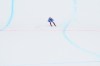 Italy's Sofia Goggia crosses the finish line of an alpine ski, women's World Cup super-G in St. Moritz, Switzerland, Saturday, Dec. 11, 2021. (AP Photo/Pier Marco Tacca)