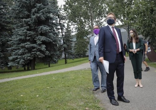 Federal Environment Minister Jonathan Wilkinson arrives to make an announcement&nbsp; in Calgary, Alta., Tuesday, July 20, 2021. The government says it plans to plant up to 320 million trees a year to meet the Prime Minister’s target to put an extra 2 billion trees in the ground by 2030. THE CANADIAN PRESS/Jeff McIntosh