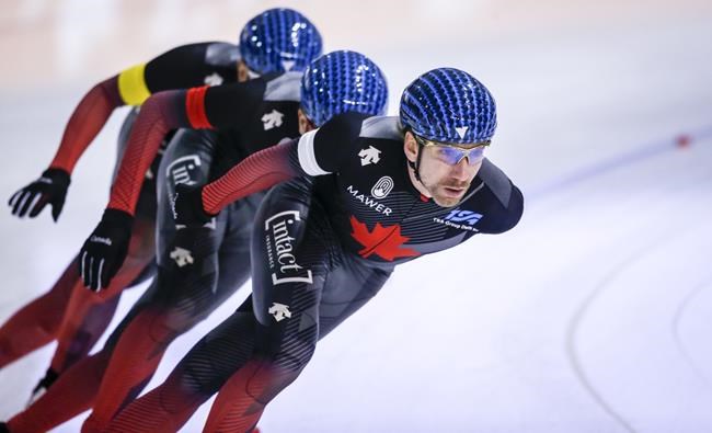 Canada's Ted-Jan Bloemen, right, leads teammates during the men's team pursuit competition at the ISU World Cup speed skating event in Calgary, Alta., Sunday, Dec. 12, 2021.THE CANADIAN PRESS/Jeff McIntosh