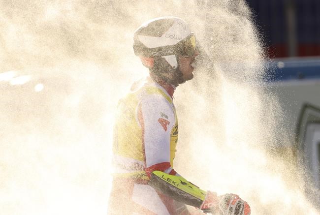 Austria's Stefan Brennsteiner reacts at finish area after completing an alpine ski, men's World Cup giant slalom race in Alta Badia, Italy, Monday, Dec. 20, 2021. (AP Photo/Alessandro Trovati)