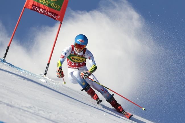 United States' Mikaela Shiffrin speeds down the slope during the first run of an alpine ski, women's World Cup giant slalom, in Courchevel, France, Tuesday, Dec. 21, 2021. (AP Photo/Giovanni Maria Pizzato)