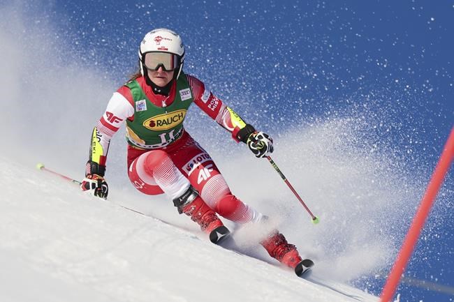 Poland's Maryna Gasienica Daniel speeds down the slope during the first run of an alpine ski, women's World Cup giant slalom, in Courchevel, France, Tuesday, Dec. 21, 2021. (AP Photo/Marco Trovati)