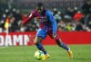 Barcelona's Ousmane Dembele controls the ball during the Spanish La Liga soccer match between Barcelona and Elche at the Camp Nou stadium, in Barcelona, Spain, Saturday, Dec. 18, 2021. (AP Photo/Joan Monfort)