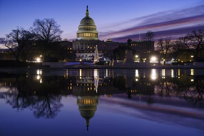 The U.S. Capitol is seen at dawn, one year after the violent Jan. 6 insurrection by supporters of then-President Donald Trump who assaulted police and smashed their way into the Congress to interrupt the Electoral College certification of Democrat Joe Biden's victory, in Washington, Thursday, Jan. 6, 2022. (AP Photo/J. Scott Applewhite)