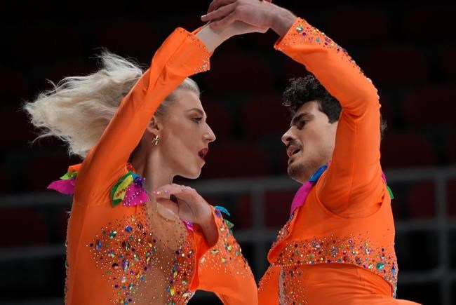 Piper Gilles and Paul Poirier perform their routine during the senior dance rhythm program at the National Skating Championships, in Ottawa, Friday, Jan. 7, 2022. THE CANADIAN PRESS/Adrian Wyld