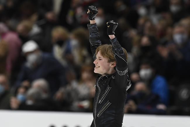 Ilia Malinin competes in the men's short program during the U.S. Figure Skating Championships Saturday, Jan. 8, 2022, in Nashville, Tenn. (AP Photo/Mark Zaleski)