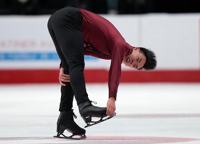 Nam Nguyen performs his routine during the senior men's free program at the National Skating Championships, Saturday, Jan. 8, 2022 in Ottawa. THE CANADIAN PRESS/Adrian Wyld
