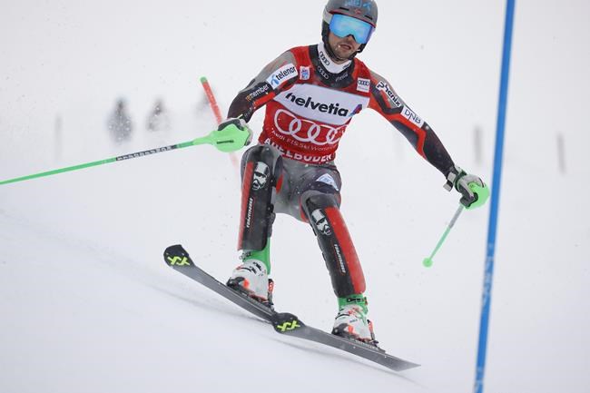 Norway's Sebastian Foss Solevaag speeds down the course during the first run of an alpine ski, men's World Cup slalom, in Adelboden, Switzerland, Sunday, Jan.9, 2022. (AP Photo/Giovanni Maria Pizzato)