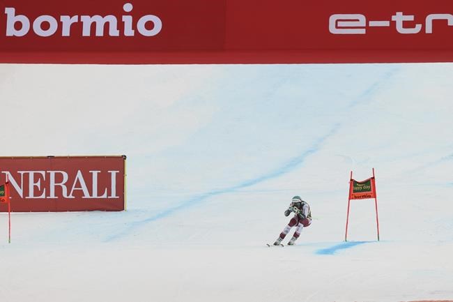 Austria's Vincent Kriechmayr arrives at the finish line during an alpine ski men's World Cup super-G, in Bormio, Italy, Wednesday, Dec. 29, 2021. (AP Photo/Luciano Bisi)