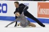 Madison Chock and Even Bates compete in the ice dance program during the U.S. Figure Skating Championships Saturday, Jan. 8, 2022, in Nashville, Tenn. (AP Photo/Mark Zaleski)