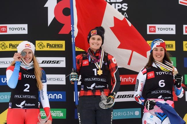 Silver medalist Fanny Smith, left, of Switzerland; gold medalist Marielle Thompson, center, of Canada; and bronze medalist Alizee Baron, of France, celebrate on the podium after the women's ski cross event at the freestyle ski and snowboard world championships in Solitude, Utah Saturday, Feb. 2, 2019. World Cup races Friday and Saturday at Nakiska resort, west of Calgary, feature a deep host team, particularly on the women’s side with five Canadians ranked in the world’s top 10. THE CANADIAN PRESS/AP-Alex Goodlett