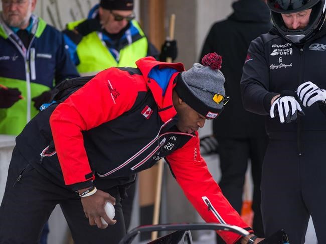 Canadian bobsledder Seyi Smith prepares to compete at a World Cup event in St. Moritz, Switzerland in this Jan. 12, 2018 handout photo. Smith is running for a position on the International Olympic Committee's athletes' commission. Athletes will vote to fill two vacant spots during the Winter Olympics in Beijing from Feb. 4 to Feb. 20. THE CANADIAN PRESS/HO, Seyi Smith *MANDATORY CREDIT*