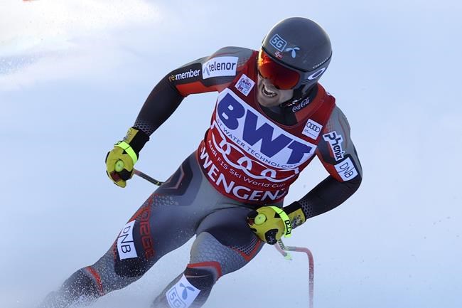 Norway's Aleksander Aamodt Kilde celebrates at the finish area of an alpine ski, men's World Cup super G, in Wengen, Switzerland, Thursday, Jan. 13, 2022. (AP Photo/Luciano Bisi)