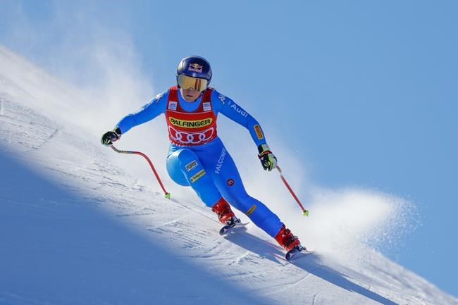 Italy's Sofia Goggia speeds down the course during an alpine ski, women's World Cup downhill race, in Zauchensee, Austria, Saturday, Jan. 15, 2022. (AP Photo/Giovanni Maria Pizzato)