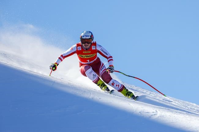 Austria's Ramona Siebenhofer speeds down the course during an alpine ski, women's World Cup downhill race, in Zauchensee, Austria, Saturday, Jan. 15, 2022. (AP Photo/Giovanni Maria Pizzato)