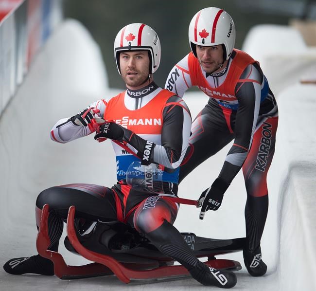 Tristan Walker and Justin Snith of Canada are seen during the second run of doubles luge during the Viessmann Luge World Cup in Whistler, B.C., Saturday, Dec. 14, 2019. THE CANADIAN PRESS/Jonathan Hayward