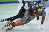 Charles Hamelin of Canada competes during the men's 1000m preliminary race of the ISU Short Track Speedskating World Cup in Debrecen, Hungary, Friday, Nov. 19, 2021. THE CANADIAN PRESS/Zsolt Czegledi/MTI via AP
