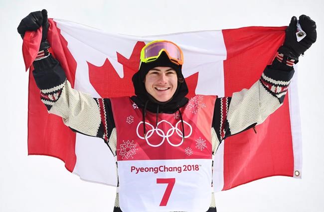 Gold medallist Sebastien Toutant of Canada celebrates following the men's snowboard big air final at the 2018 Winter Olympic Games in Pyeongchang, South Korea, Saturday, Feb. 24, 2018. THE CANADIAN PRESS/Jonathan Hayward