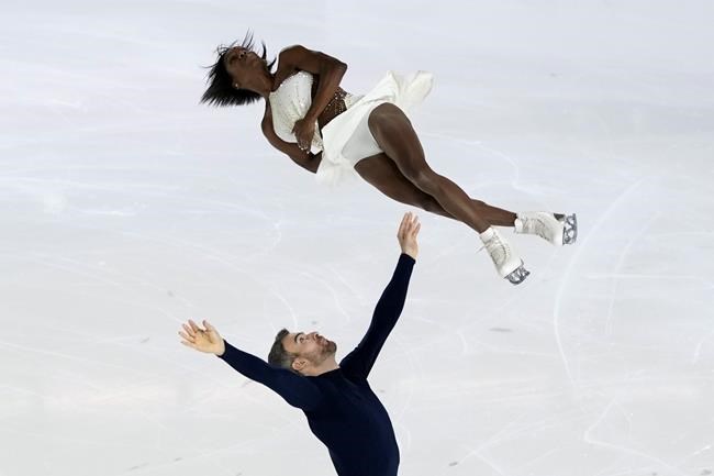 Vanessa James and Eric Radford of Canada compete in the Pair Short Program during the ISU figure skating France's Trophy, in Grenoble, French Alps, France, Friday, Nov. 19, 2021. THE CANADIAN PRESS/AP /Francois Mori