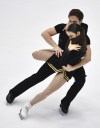 Caroline Green and Michael Parsons of USA perform their ice dance free dance skating program during the ISU Four Continents Figure Skating Championships in Tallinn, Estonia, Thursday, Jan. 20, 2022. (AP Photo/Sergei Stepanov)