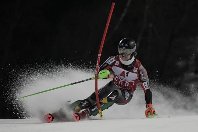 Norway's Lucas Braathen speeds down the course during the first run of an alpine ski, men's World Cup slalom, in Schladming, Austria, Tuesday, Jan. 25, 2022. (AP Photo/Giovanni Auletta)
