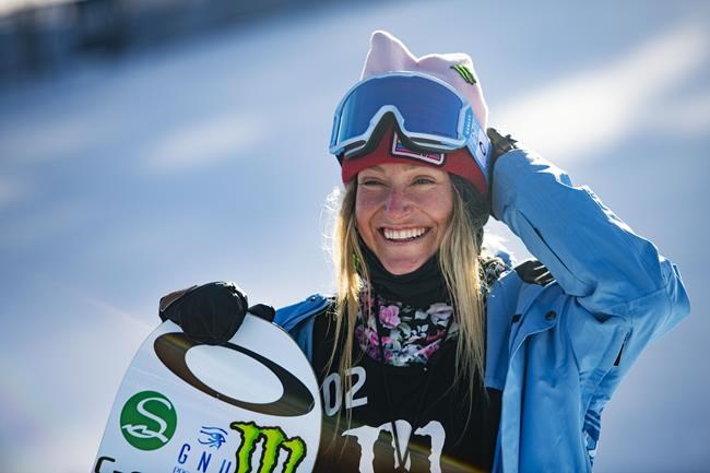 FILE - Jamie Anderson stands at the bottom of the big air course after winning her second gold medal during the Winter X Games on Sunday, Jan. 31, 2021, in Aspen, Colo. Even in a sport filled with nonconformists, Anderson stands out. The 31-year-old from South Lake Tahoe, California, is one of the most thoughtful people in her business. (Kelsey Brunner/The Aspen Times via AP, File)