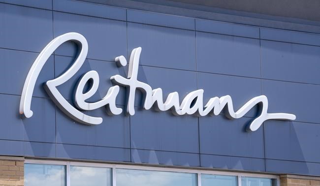 A Reitmans sign is seen on a storefront in Montreal on Tuesday, June 18, 2019. Freshly off the heels of creditor protection, Reitmans (Canada) Ltd. is launching an online marketplace for women's clothing. THE CANADIAN PRESS/Paul Chiasson