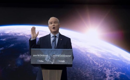 Leader of the Opposition Erin O'Toole speaks about climate change during an announcement at an event in Ottawa, Thursday April 15, 2021.&nbsp;A Conservative riding association has launched a petition against leader Erin O'Toole's decision to introduce a carbon tax.&nbsp; THE CANADIAN PRESS/Adrian Wyld