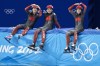 Canada's Danae Blais, Courtney Sarault, Florence Brunelle, left to right, ham it up during a short track speed skating practice session at the 2022 Winter Olympics in Beijing on Tuesday, February 1, 2022. THE CANADIAN PRESS/Paul Chiasson