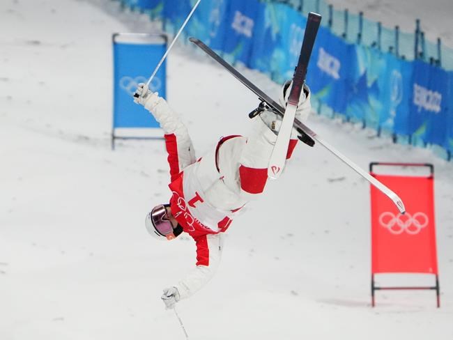 Mikael Kingsbury, of Canada, competes in the heats during the men's moguls at the 2022 Winter Olympics in Zhangjiakou, China on Saturday, February 5, 2022. THE CANADIAN PRESS/Sean Kilpatrick