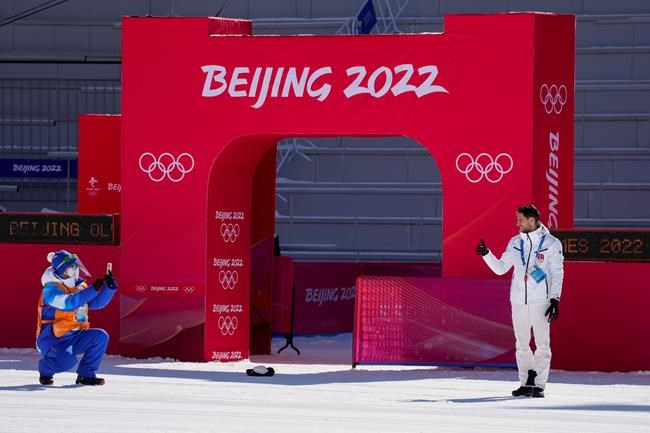 Turkey's Fatih Arda Ipcioglu poses for a photo before the start of ski jumping competition at the 2022 Winter Olympics, Wednesday, Feb. 2, 2022, in Zhangjiakou, China. (AP Photo/Andrew Medichini)