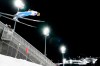 Peter Prevc, of Slovenia, soars through the air during the mixed team trial round at the 2022 Winter Olympics, Monday, Feb. 7, 2022, in Zhangjiakou, China. (AP Photo/Andrew Medichini)