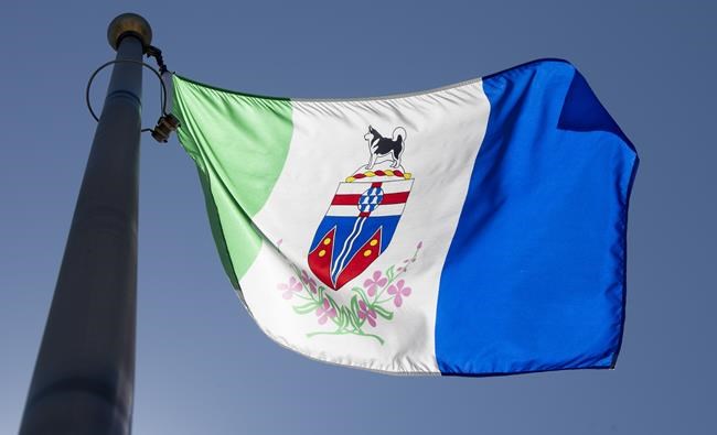 The Yukon provincial flag flies in Ottawa, Monday July 6, 2020. The census data for 2021 tells a very different story across Canada's three territories. Yukon leads the country in population growth from 2016 to 2021, increasing by 12.1 per cent and bringing its population from 35,874 to 40,232. THE CANADIAN PRESS/Adrian Wyld