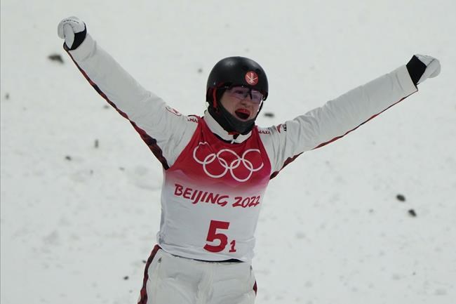 Canada's Marion Thenault competes during the mixed team aerials finals at the 2022 Winter Olympics, Thursday, Feb. 10, 2022, in Zhangjiakou, China. THE CANADIAN PRESS/AP/Lee Jin-man