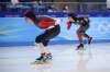 Martina Sablikova of the Czech Republic, left, competes against Ivanie Blondin of Canada in the women's speedskating 3,000-meter race at the 2022 Winter Olympics, Saturday, Feb. 5, 2022, in Beijing. (AP Photo/Sue Ogrocki)